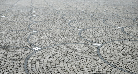 historic pavement with fish scale pattern, made of small granite cobblestones © SusaZoom