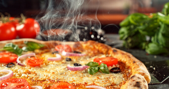 Close-up of a freshly baked pizza with melted cheese and golden crust in warm, appetizing light. Classic comfort food concept with rich texture and inviting presentation.