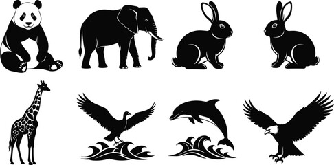 Black vector silhouette set of diverse wild animals including a panda elephant rabbits giraffe dolphin and flying eagles for wildlife and nature conservation branding © MdNoor