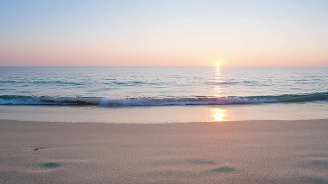Serene beach at sunrise calm ocean waves gently lapping sandy shore warm sunlight reflecting on water peaceful morning scene