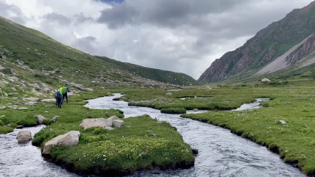 Group of hikers undertaking the multi-day Ak-Su Traverse in the spectacular Terim Tor Valley, Kyrgyzstan.
