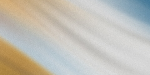 Obraz premium A close-up view of a sandy beach with blue and yellow tones