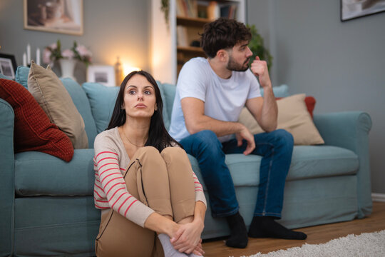 Couple experiencing conflict and relationship problems at home