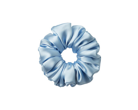 Soft light blue silk scrunchie with ruffled edges, isolated on white background