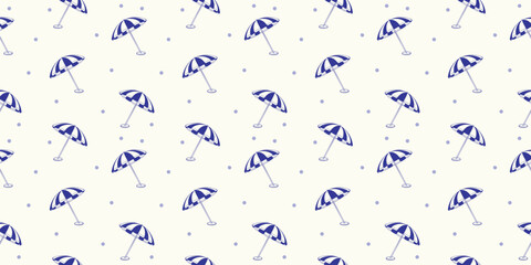 Obraz premium Hand Drawn Seamless Pattern Featuring Navy Blue Striped Beach Umbrellas and Polka Dots on a Cream Background for Coastal Summer Textile Design