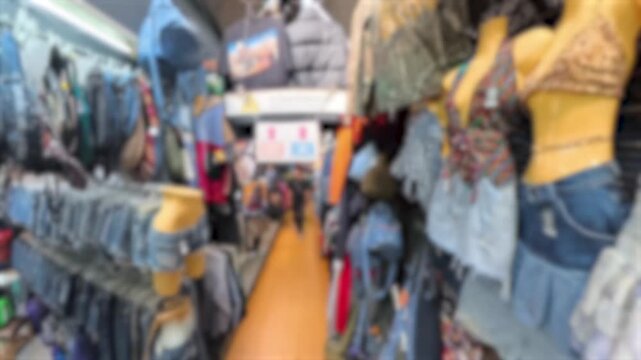 BANGKOK, THAILAND - NOV 2025 : Blurred walking view of Chatuchak Weekend Market. Largest market in Thailand. Travel and tourism concept video. Time lapse shot.