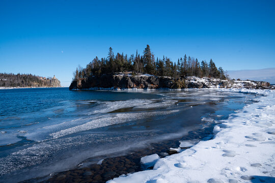 Woman exploring Tettegouche State Park in North Shore Minnesota during a winter polar vortex