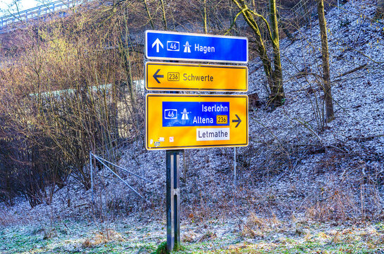 German road signs indicating directions to Hagen, Schwerte, Iserlohn, Altena, and Letmathe