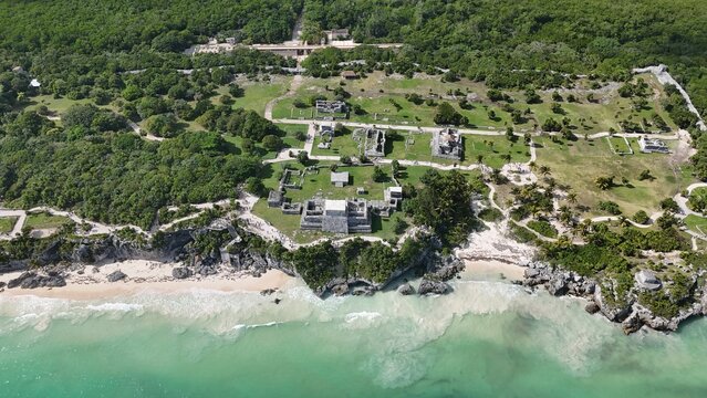 Pyramids of Mexico ath the carribean sea with white beaches. Lush Jungle and some ruins