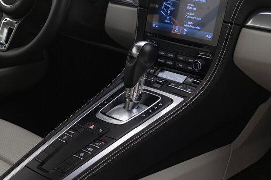 Porsche 718 Cayman center console and gear shifter, Luxury sports car interior controls and transmission