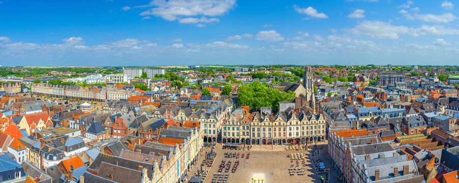Aerial panoramic view of Arras city historical centre, La Grand Place and La Petite Place des Heros square with Flemish-Baroque-style townhouses buildings, Panorama of Arras old town center, France
