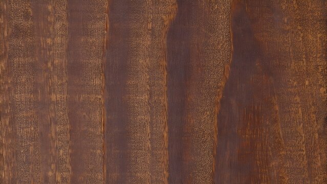 Natural rich walnut wood grain texture seamless background with vertical flowing stripes and deep warm brown veneer patterns