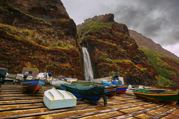 Magnificent waterfall cascades down a rocky mountainside on the exotic island of Madeira, background or wallpaper © anettastar