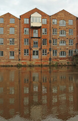 Fototapeta premium Redeveloped warehouses along the River Aire in Leeds, now fashionable flats