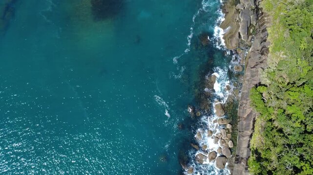 Drone Aerial View of Praia das Conchas in Ubatuba Brazil &ndash; Rocky Tropical Coastline