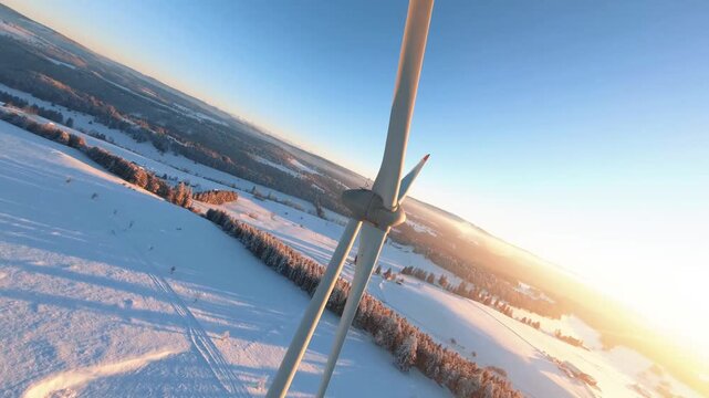 Epic FPV Drone Flight Close to a Wind Turbine Blade uring Golden Hour