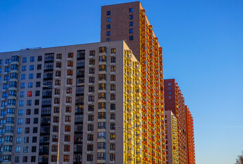 Modern Apartment Buildings Under a Clear Blue Sky