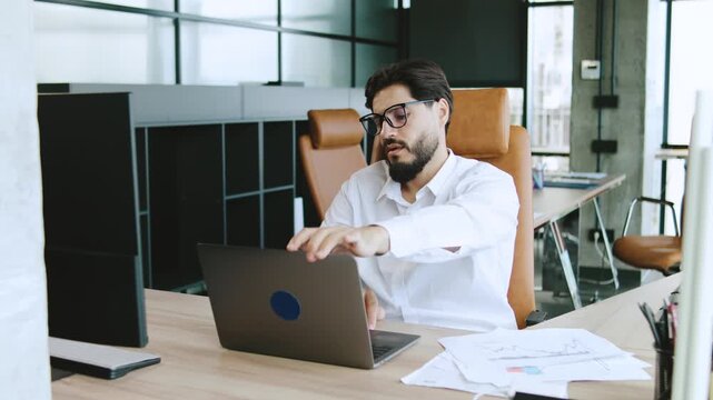 Stress, laptop and business man in office with tension for problem, financial crisis and debt review. Company, corporate and mature person with pressure, frustrated and worry for mistake or deadline