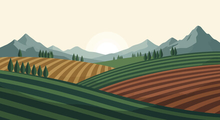 Pastoral valley landscape with layered fields and distant mountain range at sunset.