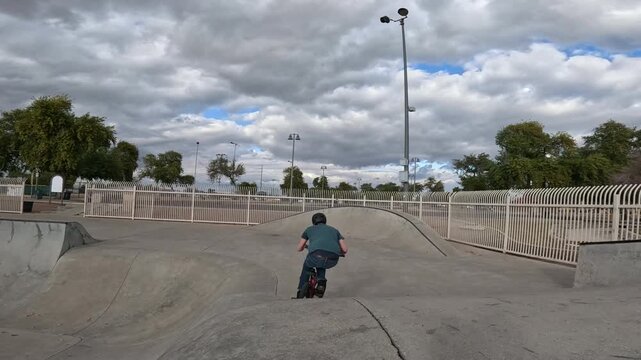 Tabletop 270 skatepark jump trick with bmx bike