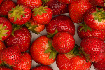 Fresh group of berries isolated on a white background.