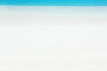 Tropical summer sandy beach with blue sea water, copy space