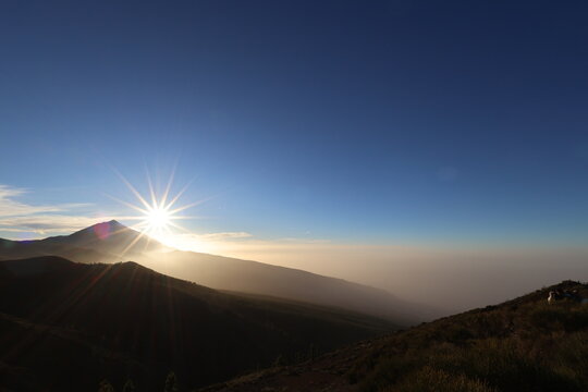 Teide National Park, Tenerife, Spain. February 16, 2026. Intense white calima from Morocco covering volcanic landscape with dust haze and reduced visibility