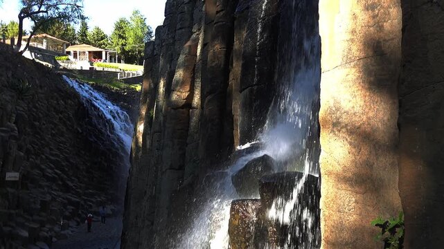 Explore Prismas Basalticos in Hidalgo Mexico at midday with flowing water and rock formations