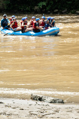 Unrecognizable Group Whitewater Rafting Adventure