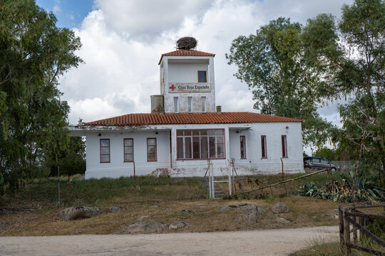 Service building with stork nest near Proserpina Reservoir, Spain