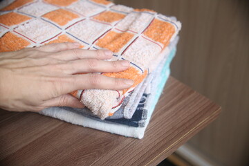 hands of a woman and bath towel