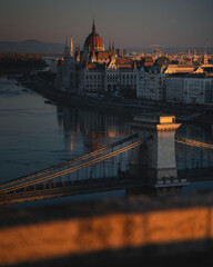 Hungarian Parliament and Chain Bridge at Autumn Sunrise in Budapest