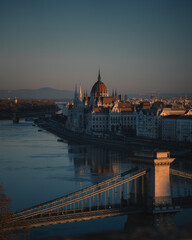 Hungarian Parliament and Chain Bridge at Autumn Sunrise in Budapest