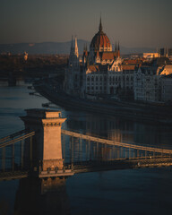 Hungarian Parliament and Chain Bridge at Autumn Sunrise in Budapest