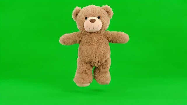 Cute plush teddy bear walking, spinning, and jumping on chroma key