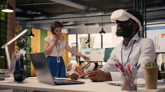 Black professional using VR glasses in corporate office environment. High-tech virtual reality applications display charts and performance metrics, combining metaverse simulation and data analysis.