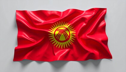 A vibrant, silk-like flag of a nation is rendered with dynamic folds against a neutral background. The central design is golden on red