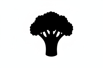 Silhouetted Tree: An elegant silhouette of a tree, its branches reaching skyward. The image is a striking contrast against a soft background.  © MetaPixel Studio