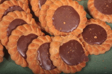 chocolate cookies on a green backgound