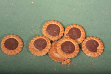 chocolate cookies on a green backgound