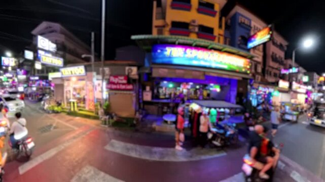 PATTAYA, THAILAND - NOV 2025 : Blurred view of Soi Buakhao street. Famous for beer bars, massages, hotel and various kind of nightlife places. Travel and tourism concept video.