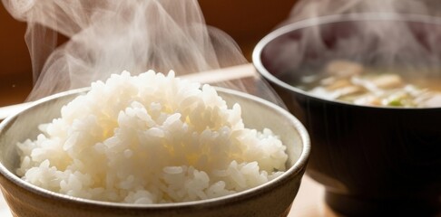 Steaming freshly cooked rice &ndash; traditional Japanese washoku breakfast image