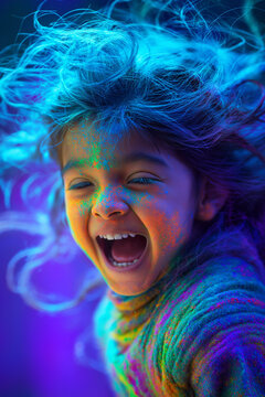 Happy girl celebrating Holi festival with colorful powder, joyful child laughing during traditional Indian celebration of colors