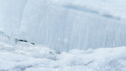 Natural ice floe from needles as crystalline pattern in cold seasonal environment. Concept of elemental beauty, serene wilderness mood. Macro detailed winter banner of frozen icy crystals, cool blue