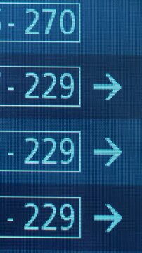 Digital display screen showing sequential numerical updates with directional arrows indicating movement, highlighting changes in values across three frames in a modern interface
