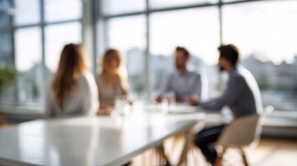 Business people collaborating at a conference table, having a discussion in a bright, modern office setting