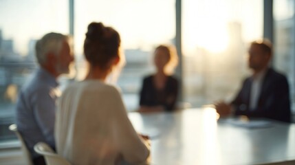 Business professionals meeting in modern office during sunset, collaborating and discussing ideas