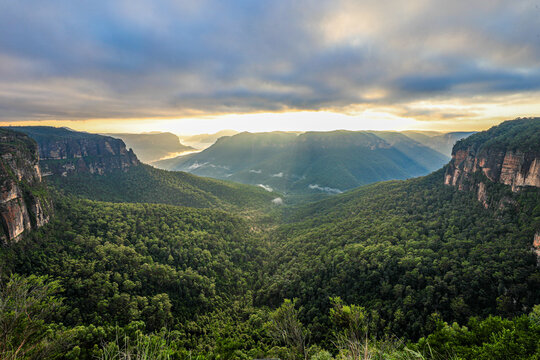 Govetts Leap Lookout in the Blue Mountains, New South Wales, Australia. Early morning light illuminates towering sandstone cliffs and the expansive Grose Valley