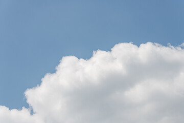 Natural sky background with soft clouds