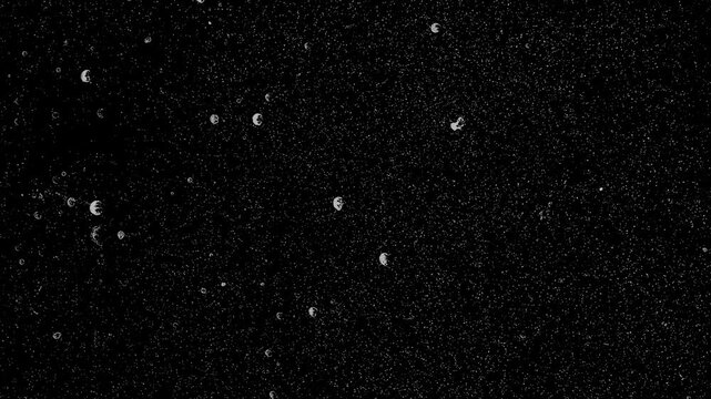 Vintage black texture background featuring scratched film grain and dust overlay effect.